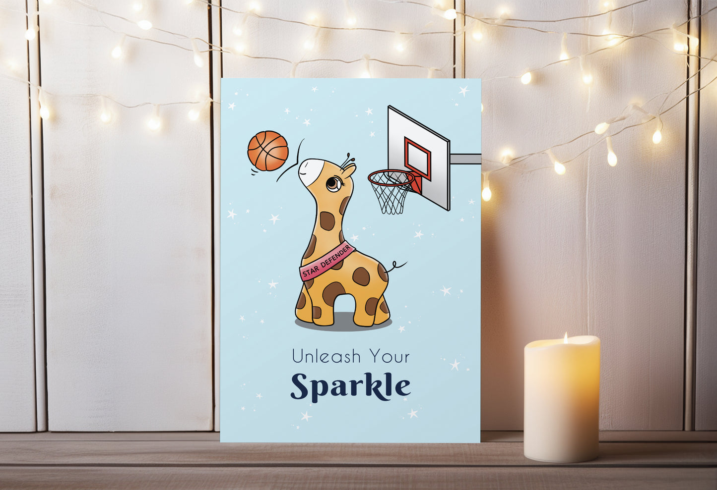 A kawaii greeting card from Rainbow & Bubbles, showing Baby Giraffe in her element as the Star Defender at basketball. The front says "Unleash your sparkle".