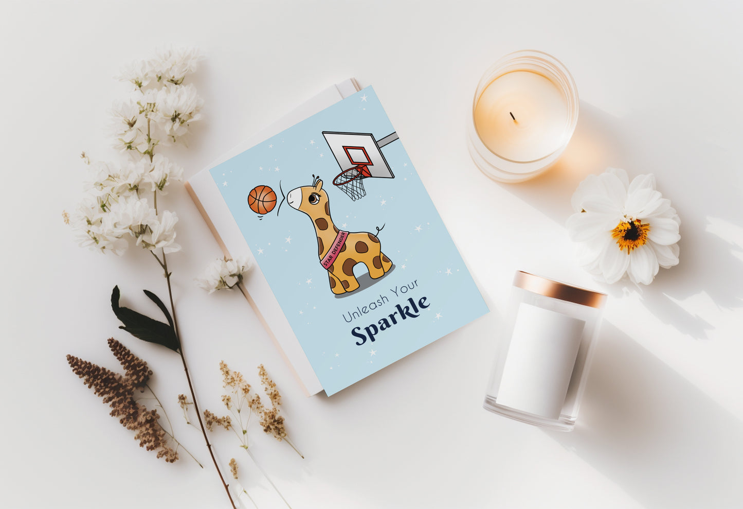 A kawaii greeting card from Rainbow & Bubbles, showing Baby Giraffe in her element as the Star Defender at basketball. The front says "Unleash your sparkle".