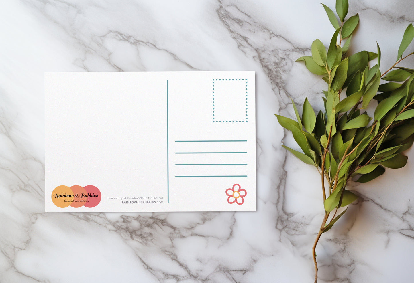 The back of a kawaii postcard from Rainbow & Bubbles with a cute and colorful design.