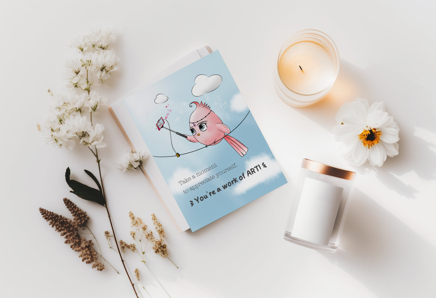 A kawaii greeting card from Rainbow & Bubbles, showing Little Birdie appreciating herself. The front says "Take a moment to appreciate yourself. You're a work of art!"