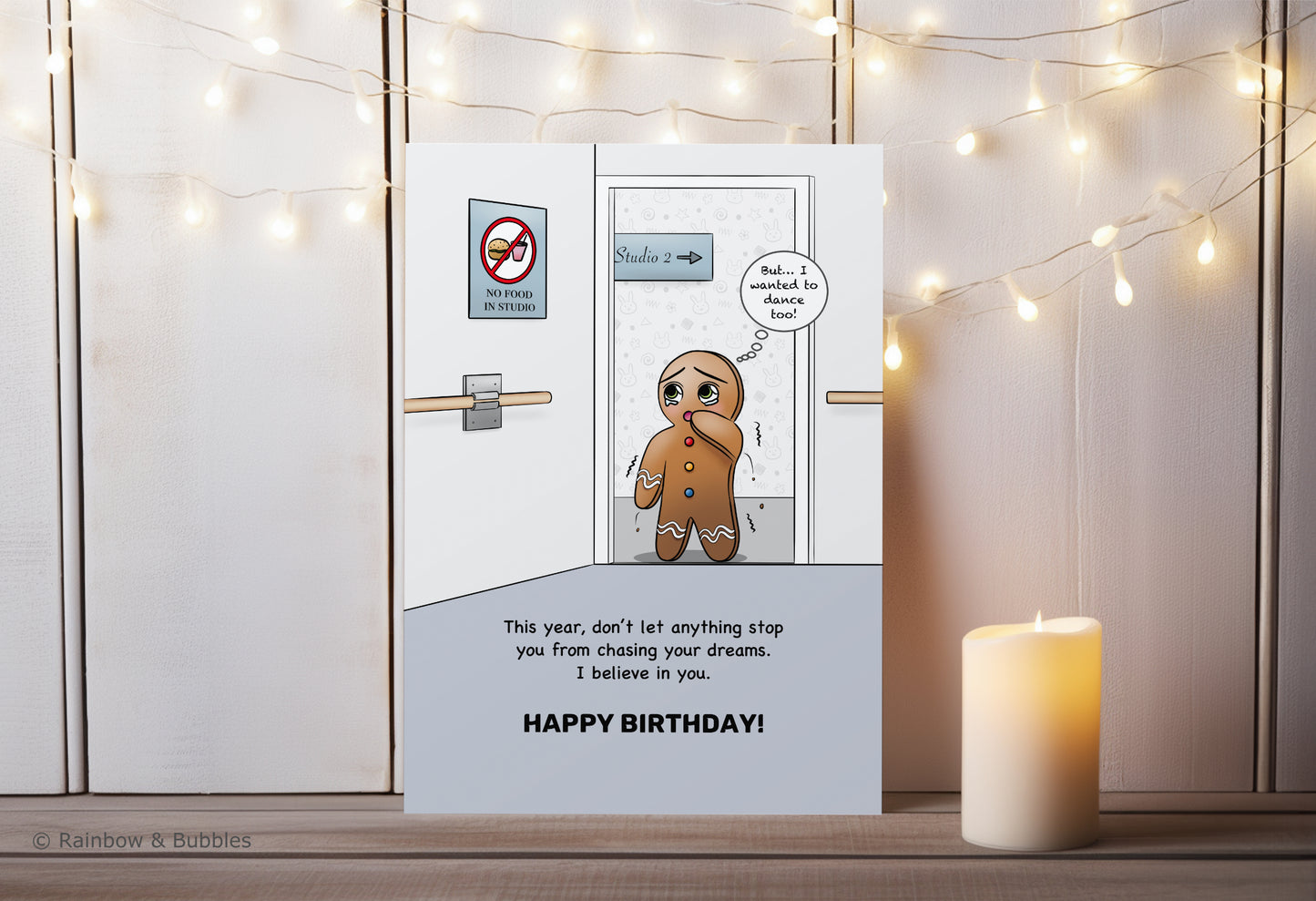 A kawaii birthday card from Rainbow & Bubbles, showing a gingerbread man who is facing an obstacle in his journey towards his dreams.