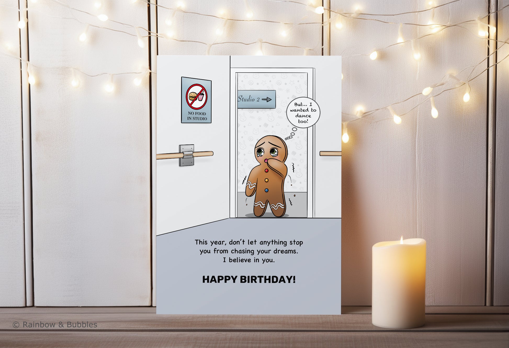 A kawaii birthday card from Rainbow & Bubbles, showing a gingerbread man who is facing an obstacle in his journey towards his dreams.