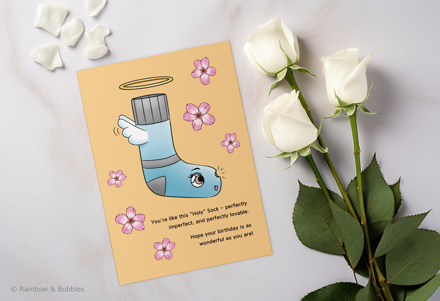 A kawaii birthday card from Rainbow & Bubbles, showing a Holy Sock who's perfectly imperfect and perfectly lovable.