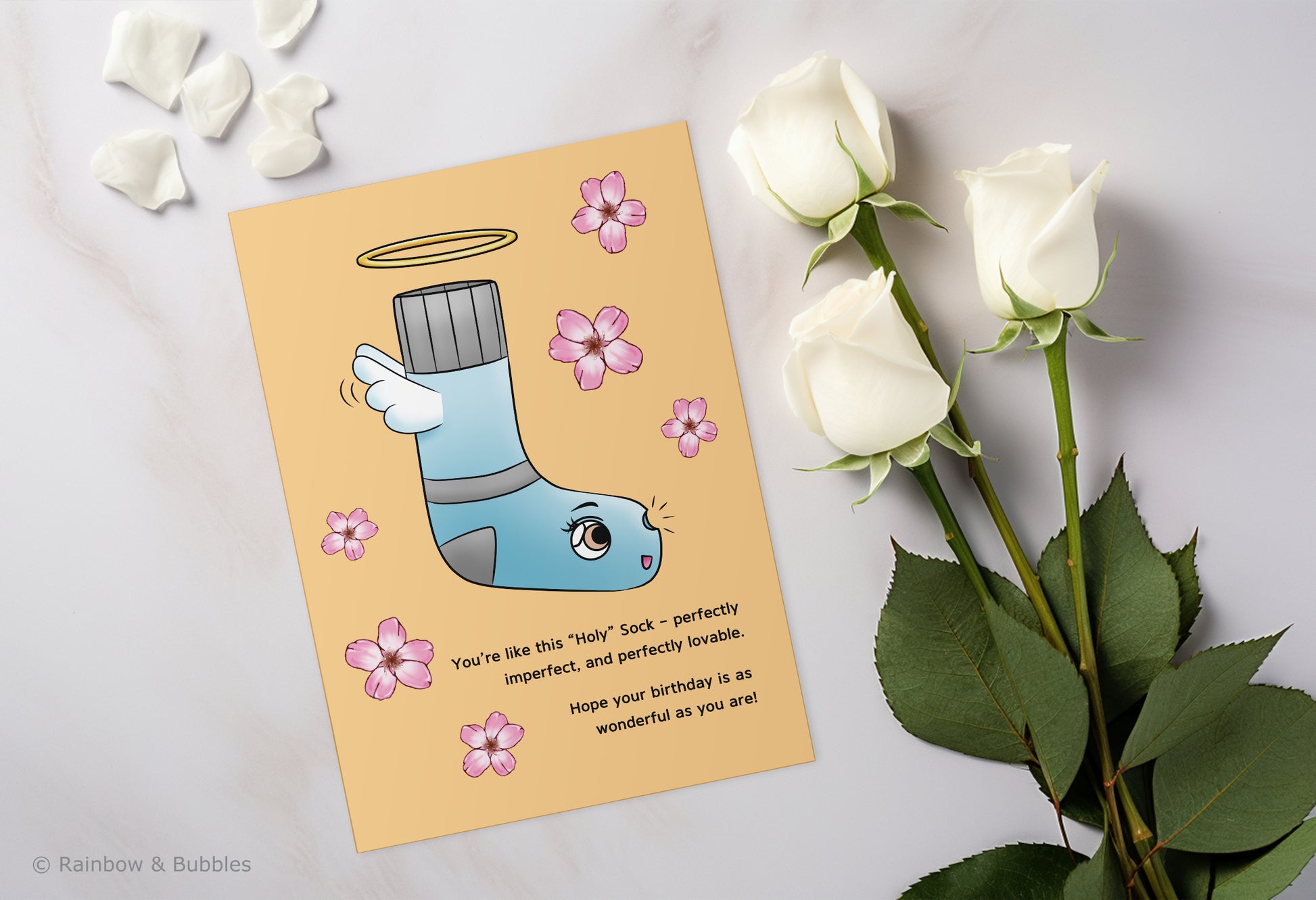A kawaii birthday card from Rainbow & Bubbles, showing a Holy Sock who's perfectly imperfect and perfectly lovable.
