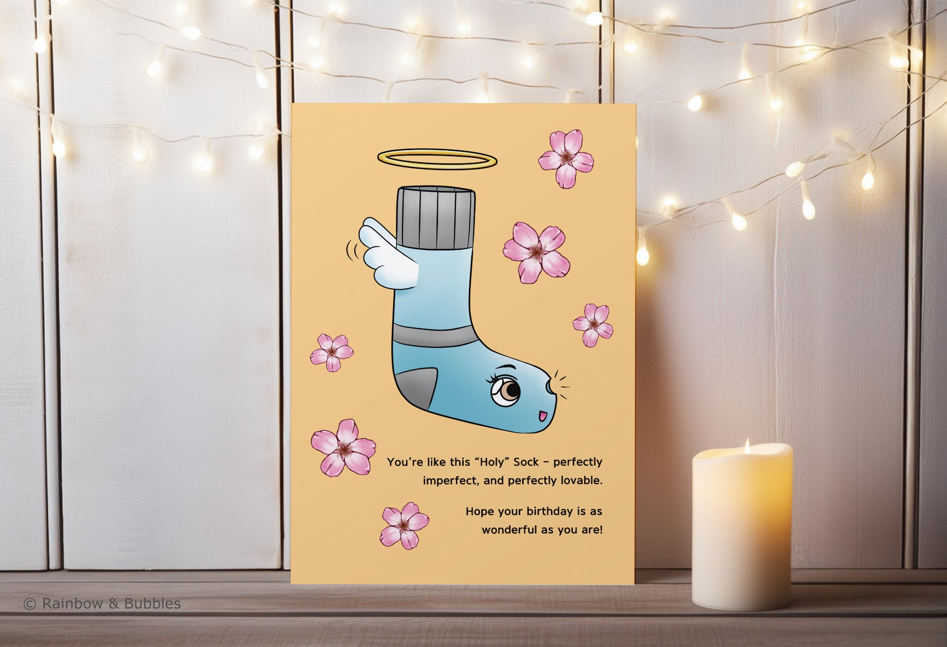 A kawaii birthday card from Rainbow & Bubbles, showing a Holy Sock who's perfectly imperfect and perfectly lovable.