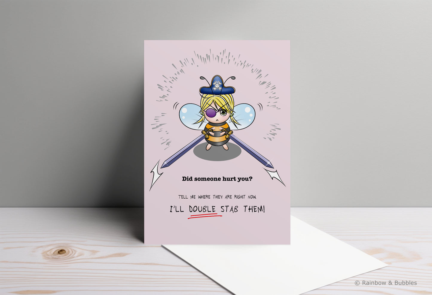 A kawaii greeting card from Rainbow & Bubbles, showing a pirate bee with massive swords.